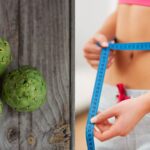 A woman measuring her stomach and three custard apples