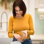 A woman making oats for constipation