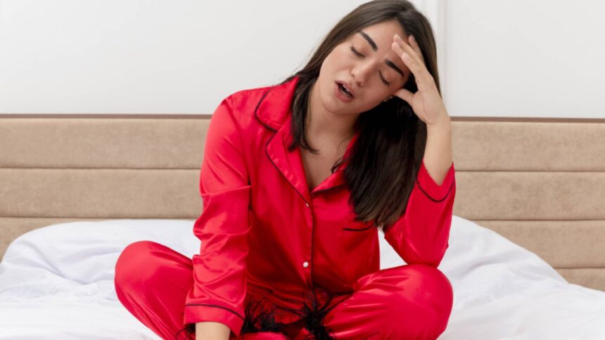 A tired woman on the bed