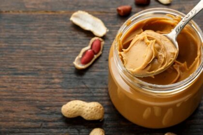 Jar of peanut butter on table